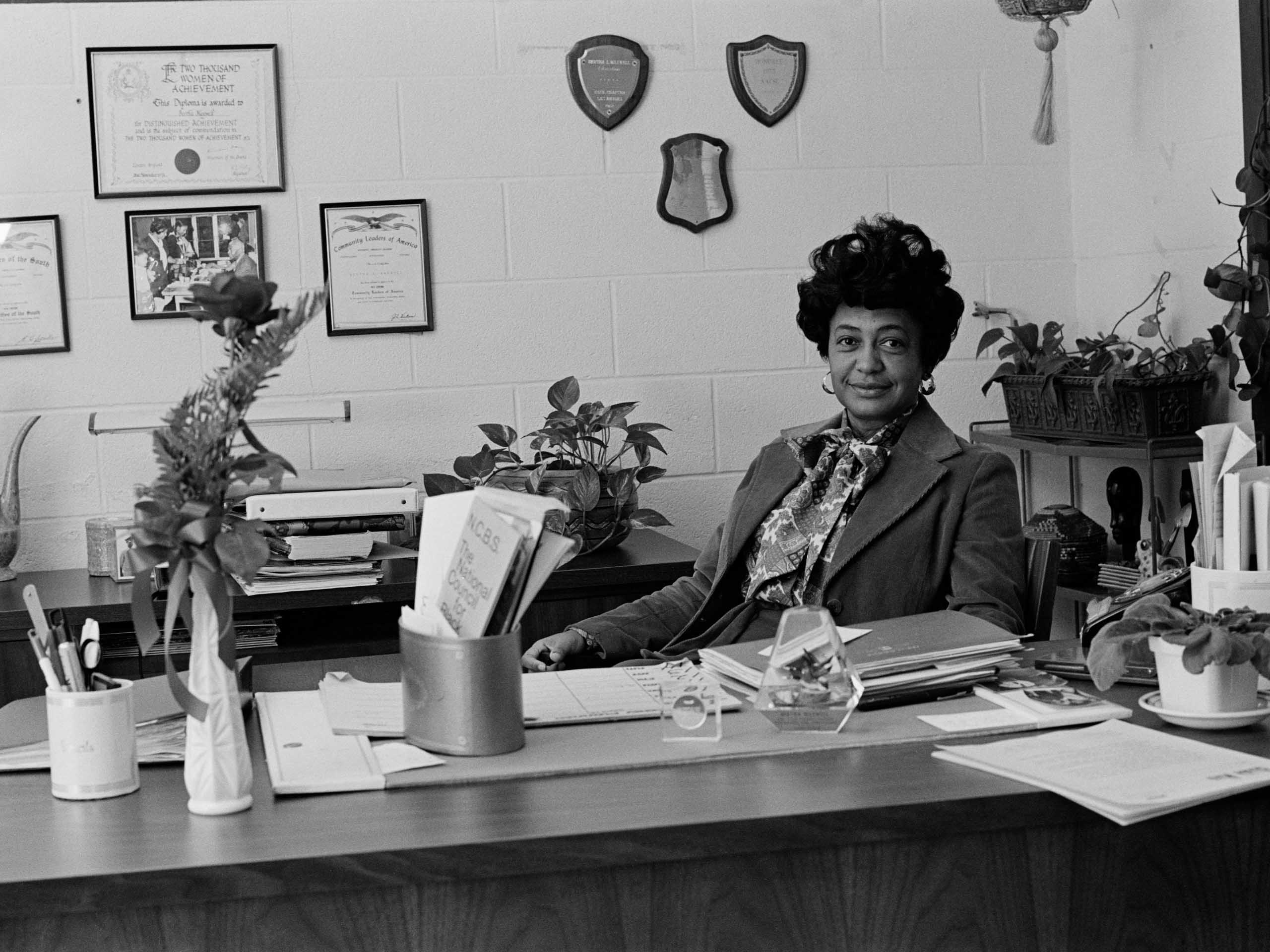 Bertha Maxwell-Roddey at her desk