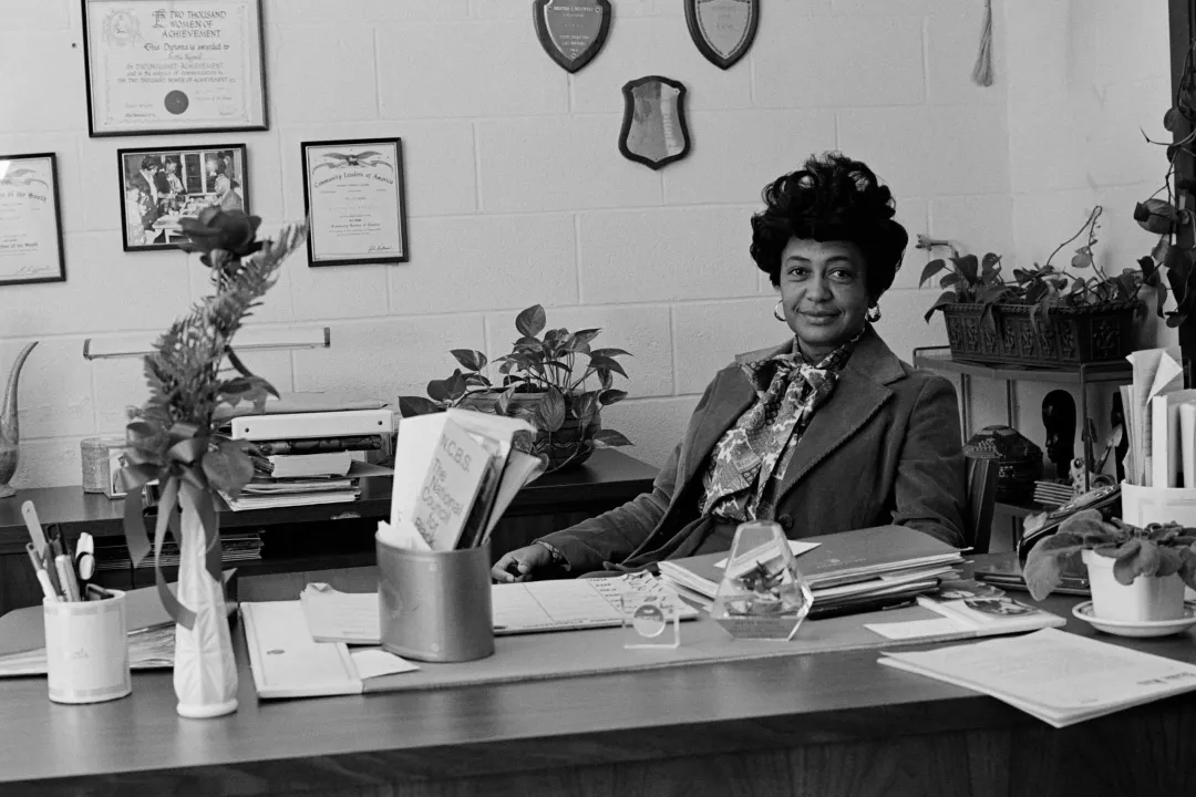 Bertha Maxwell-Roddey at her desk