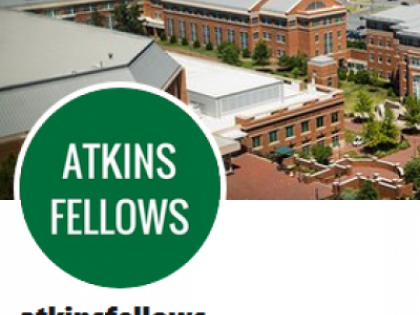 Image of library with the twitter handle @atkinsfellow